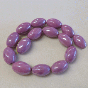 Ceramic oval beads in pink,
