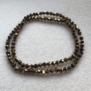 Metallic copper glass bicones