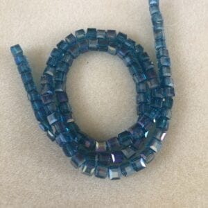 Faceted Peacock Cube Glass Beads