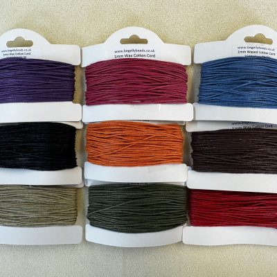 Strong waxed cotton with a thickness of 1mm. Available in many colours. Perfect for Shamballa style bracelets and macrame projects. Strong and very versatile. Sold on a card of approximately 10 metres.