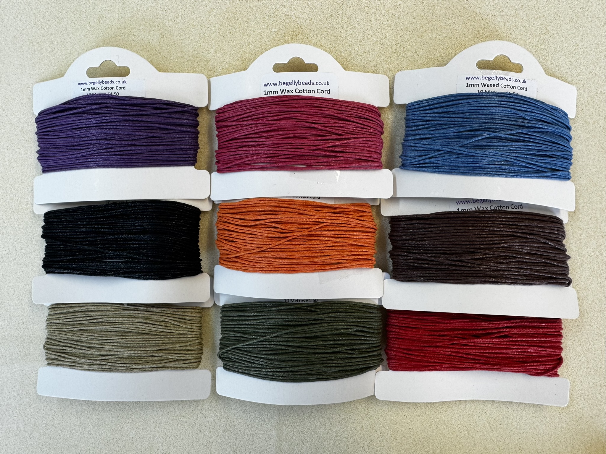 Strong waxed cotton with a thickness of 1mm. Available in many colours. Perfect for Shamballa style bracelets and macrame projects. Strong and very versatile. Sold on a card of approximately 10 metres.